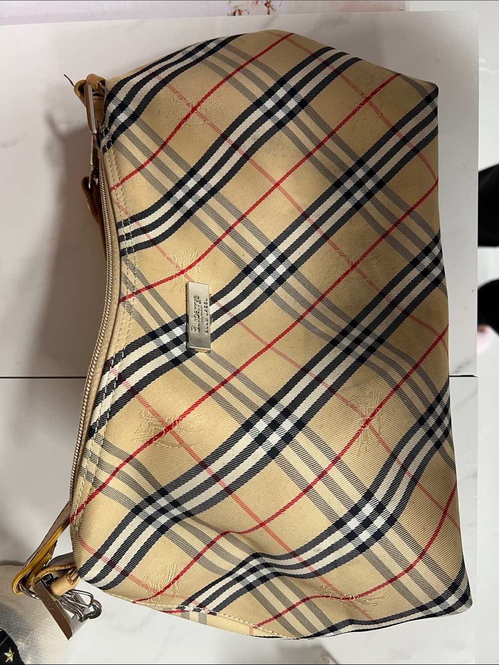blue label repaired corners and short strap missing sold as